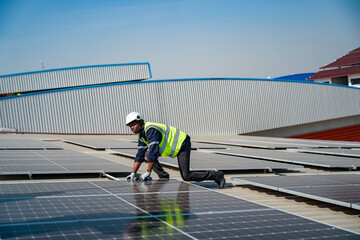 Technology solar cell, Engineer service check installation solar cell on the roof of factory. technician checks the maintenance of the solar panels