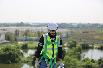 Fototapeta premium Technology solar cell, Engineer service check installation solar cell on the roof of factory. technician checks the maintenance of the solar panels
