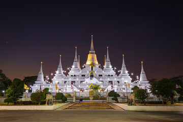 Naklejka premium Asokaram Temple, Samut Prakan twilight night Province Important old temple white pagoda