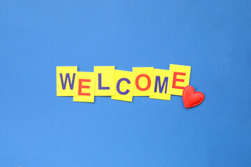 Welcome message. Inscription in yellow letters.