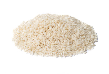 A pile of raw carnaroli rice isolated over white background