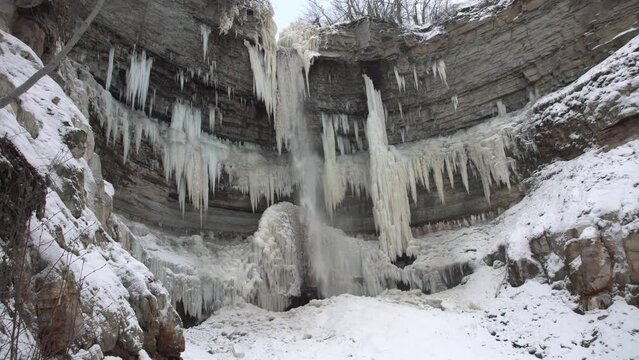 Scenic winter waterfall in ice