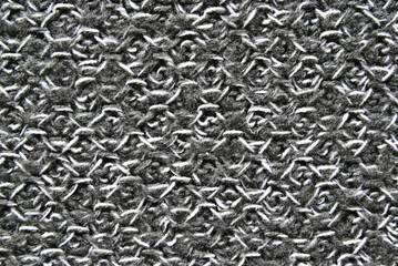 Gray soft melange woolen sweater surface texture as background