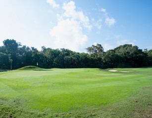 Panoramic view of a golf course green and fairway in the tropics in Mexico