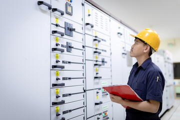 Inverter Control Room System Electrical engineers monitor the controller's frequency and current...