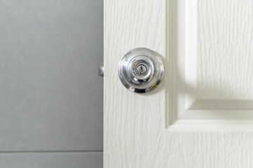 Roundly door knob lock handle home security close. The doorknob is being found that caused the COVID 19 infection. - obrazy, fototapety, plakaty
