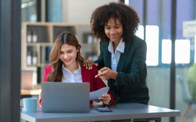 Young trader mixed race woman in formal suit friends consulting and discussing with stock market...