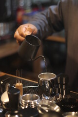 Fototapeta na wymiar barista making a cup of coffee