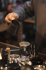 barista making a cup of coffee