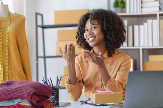 Young African American Woman Influencer Shopkeeper Selling Clothes Online At Clothing Store, Used Second Hands Clothing.