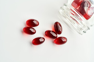 Krill oil capsules on a white background