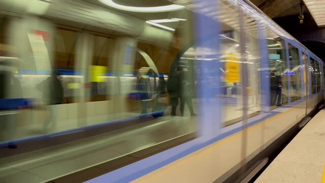 Metro train on the move arriving at Marienplatz subway station in Munich city. Underground transportation concept