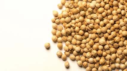 coriander seeds on a white background