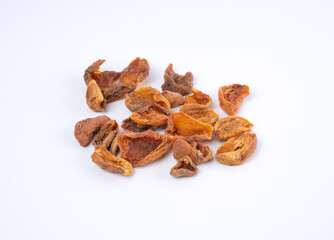 Dried Fruit Pieces On A White Background.