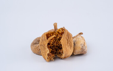 Sliced ​​Dried Figs isolated On White Background.
