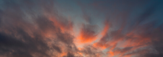 Fototapeta na wymiar Panorama view on the sunset sky. colorful evening sky background