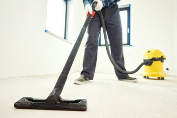 construction cleaning service. dust removal with vacuum cleaner