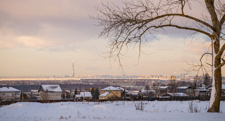 Fototapeta na wymiar View of St. Petersburg and Lakhta Center in winter from the Anninsky Heights