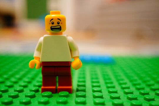 Lego man figurine with scared emotion