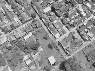 Black and white photo of bird's eye view of settlements in the Cikancung area - Indonesia.