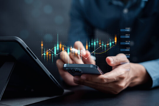 Businessmen Investor Think Before Buying Stock Market Investment Using Smartphone To Analyze Trading Data. Investor Analysis With Stock Exchange Graph On Screen. Financial Stock Market.