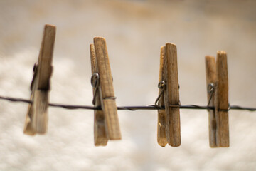 Close up of lipstick on a wet surface with water droplets.