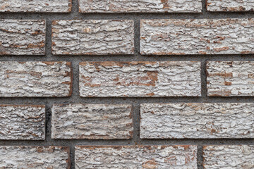 Old gray brick wall close up textured background