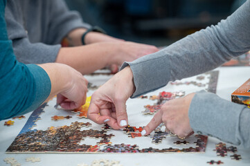 person working on a puzzle