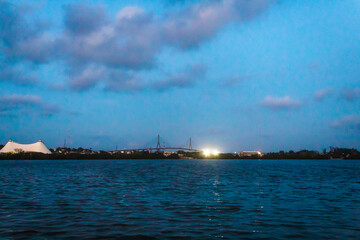 lagoon at evening in blue hour with buildings in the background, carpenter's lagoon in tampico tamaulipas 