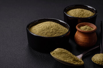 Spice dried dill or basil in the form of green powder