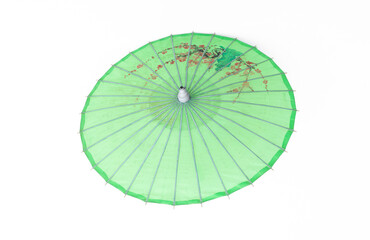 green japanese paper umbrella isolated on white background