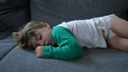 Cute child sleeping close up face of adorable toddler boy asleep in slumber afternoon nap
