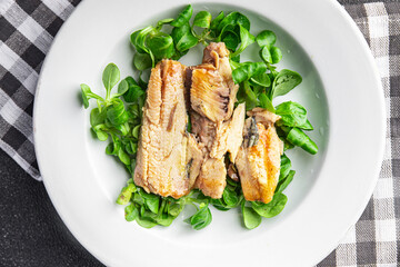 fresh sardine salad green leaves, avocado, vegetable dish meal food snack on the table copy space food background rustic top view
