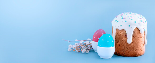 Easter egg and cake on blue  background. Spring holiday