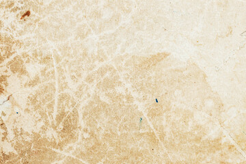 Aged and worn paper texture, grunge background, dirt surface with spots, scratches