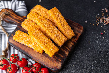 fish stick deep-fried seafood breadcrumbs fast food meal food snack on the table copy space food background rustic top view