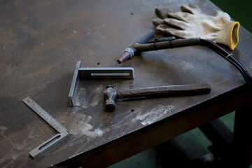 Work scene welding parts to each other