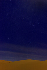 STARRY NIGHT AND NIGHT PHOTOGRAPHY DURING JEEP SAFARI IN THE SAHARA DESERT IN ALGERIA