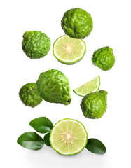 Fresh ripe bergamot fruits falling on white background