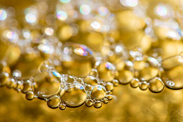 Fototapeta premium Soap bubbles, soap bubbles in closeup creating abstract background, selective focus.