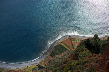 Amazing ocean with land and agro, top view. “Cabo Girão“ viewpoint near Funchal Madeira...