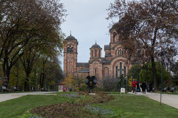 Monument to children victims of NATO aggression in Tasmajdan park in Belgrade, Saint Mark orthodox church in background