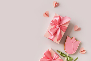 Biscuit dessert flowers with confetti on grey background