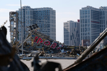 Russian missile destroyed cars and shopping center Retroville in Kyiv, Ukraine