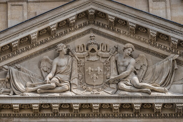Fototapeta premium Architectural fragment of the central building of the Paris military school (Ecole Militaire), founded in 1750. Paris, France.