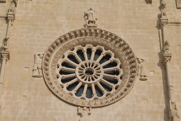 Rose window of Cathedral at Piazza Duomo in Matera, Italy
