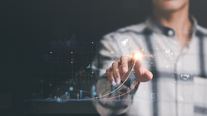 Businessman showing business growth and success graph ,concept of progress in development, financial efficiency and investment with business strategy for goals and opportunities in the industry future