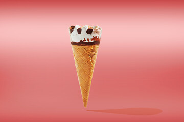 vanilla ice cream with cone on pink pastel background