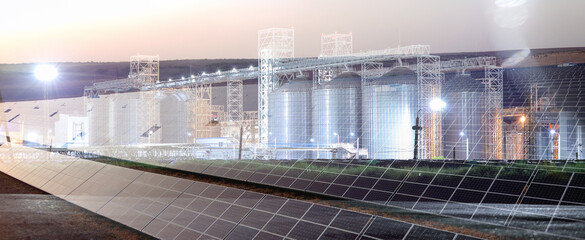 Multiple exposure of solar panels for electric power and grain elevators at sunset