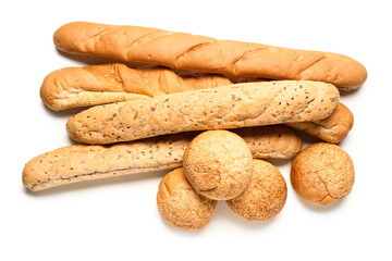 Loaves of delicious baguette and buns with sesame seeds isolated on white background